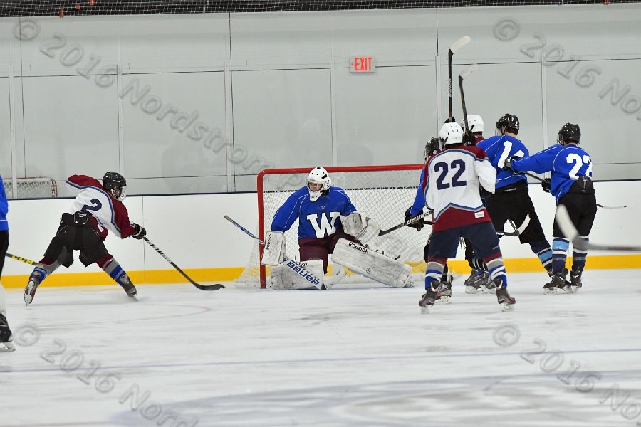 Wheaton College Men\'s Ice Hockey vs Middlesex Community College. - Photo By: KEITH NORDSTROM